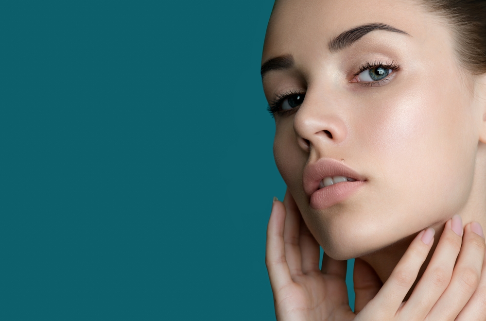 Close up of woman's smooth face after laser hair removal in New York, NY